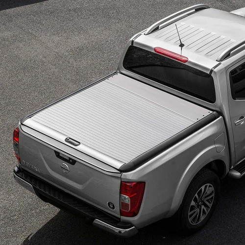 Truck bed lockable roller - bed,